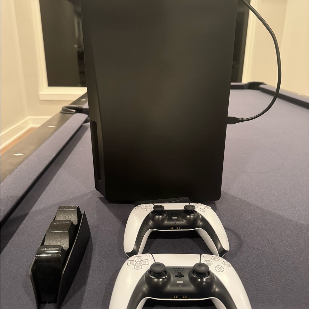 PS5 console + Additional 2 TB storage and other various items.